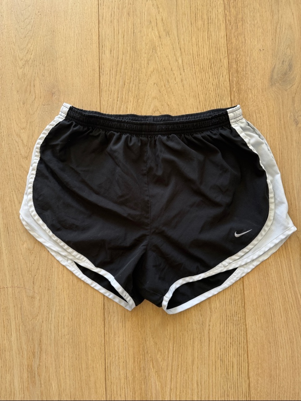 NIKE DRI-FIT! Women’s size medium. Black Athletic Shorts with White Trim